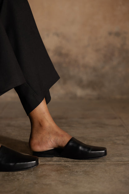 trendy and comfortable black slip-ons for women
